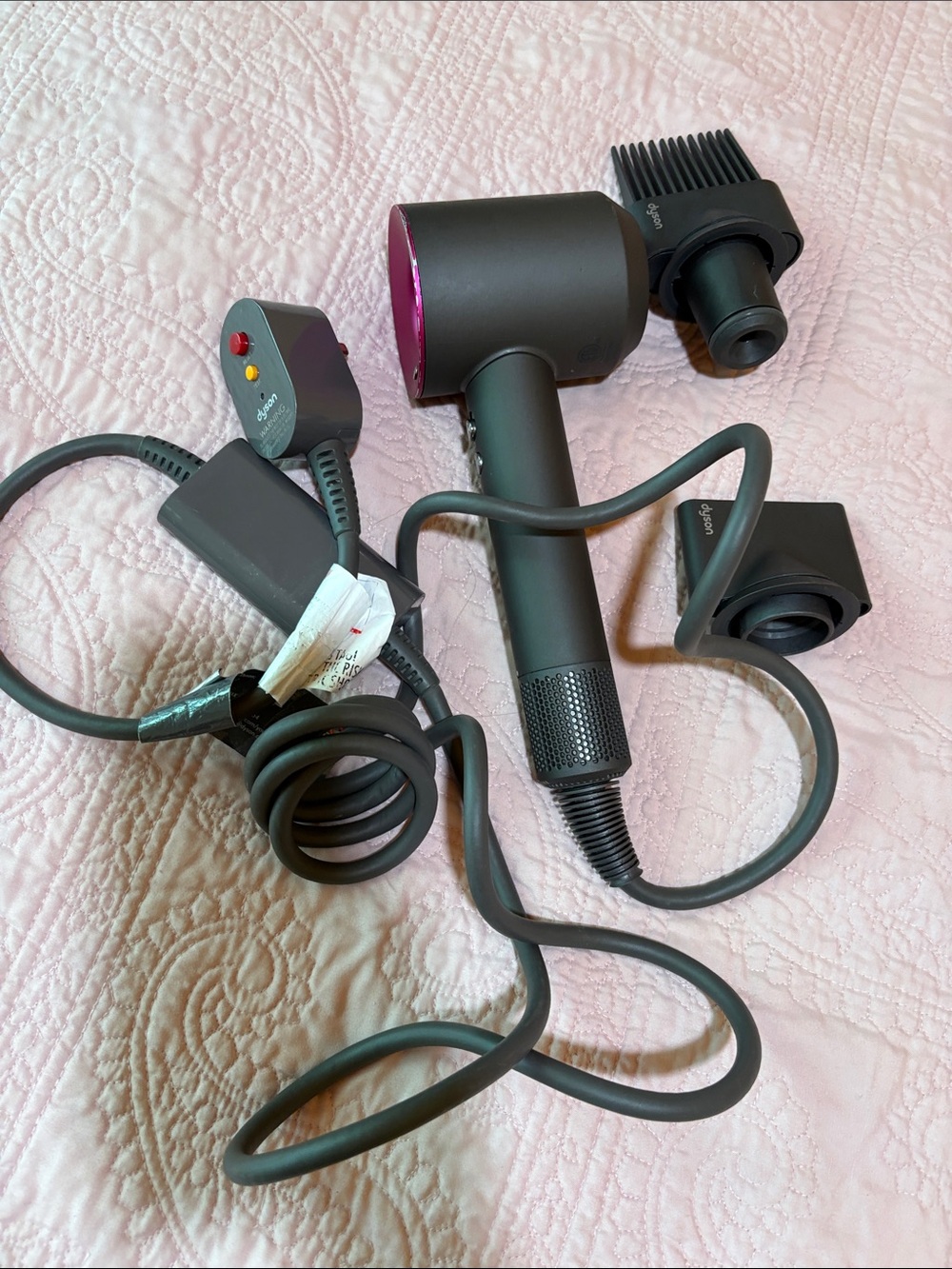 Dyson hair dryer in fuchsia pink and dark gray with attachments - Picture 7 of 7